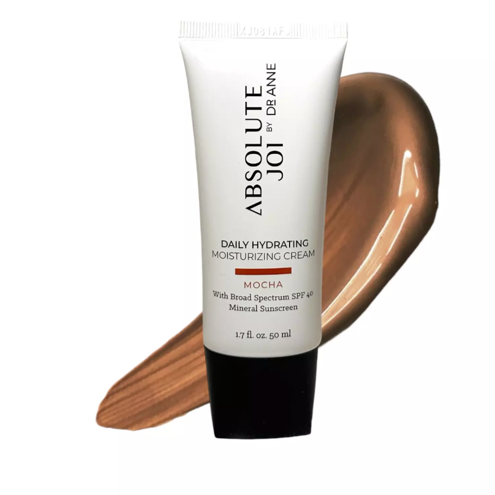 Tube of Absolute JOI Daily Hydrating Moisturizing Cream Mocha on a white background